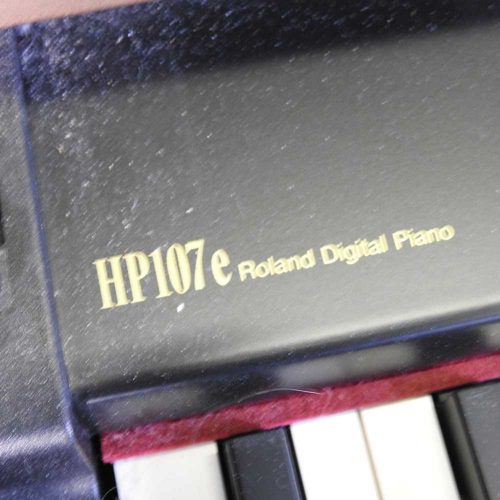 A Roland digital piano, HP107e, 141cm wide, with a piano stool - Image 3 of 13