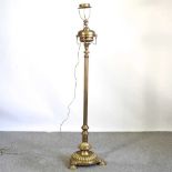 An Art Nouveau brass telescopic standard lamp, with a fluted column