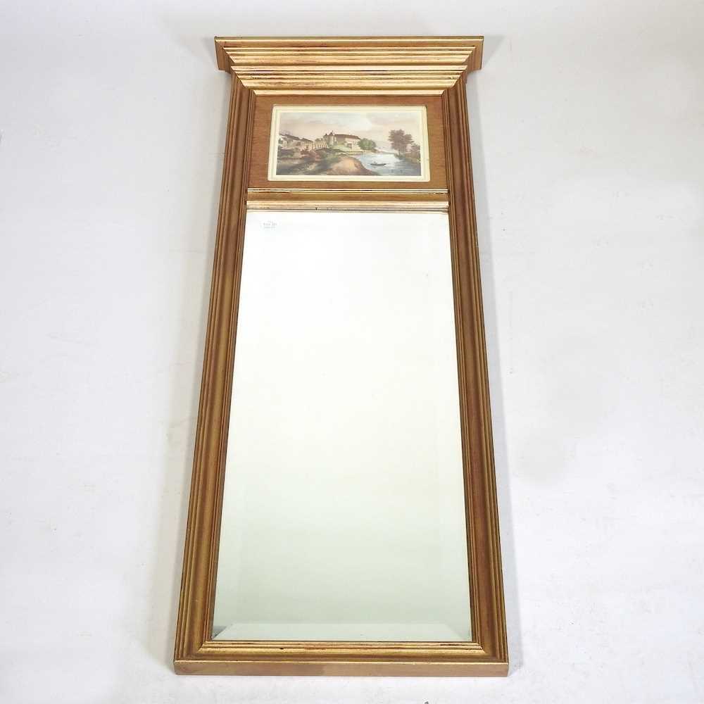 A gilt framed pier mirror, inset with a print of a French landscape, 108 x 43cm