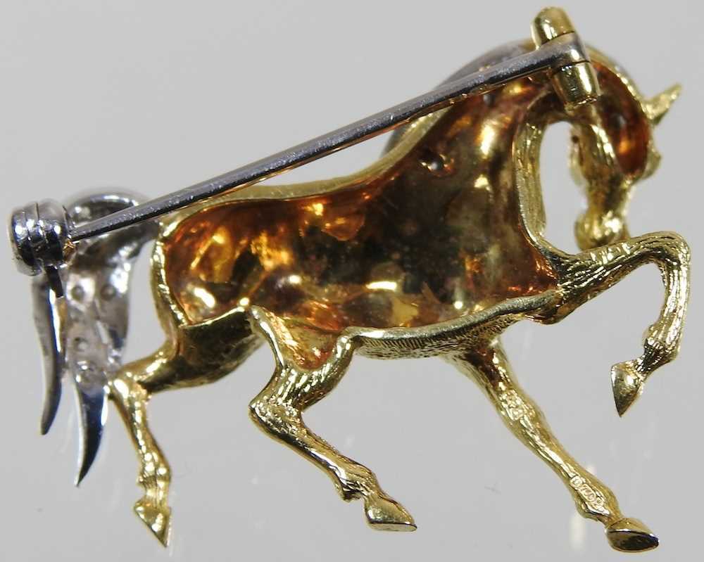 An 18 carat gold brooch, in the form of a horse, with a diamond set mane and tail, having a pin - Image 5 of 7