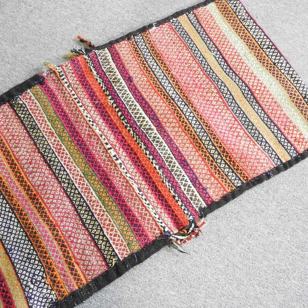 A Persian saddle bag, with zig-zag designs, 136 x 70cm - Image 2 of 3