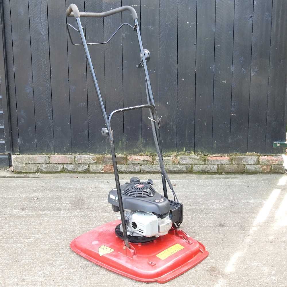 A Toro/Honda GCV 160 petrol hover lawnmower Starts and runs, with signs of use/age.