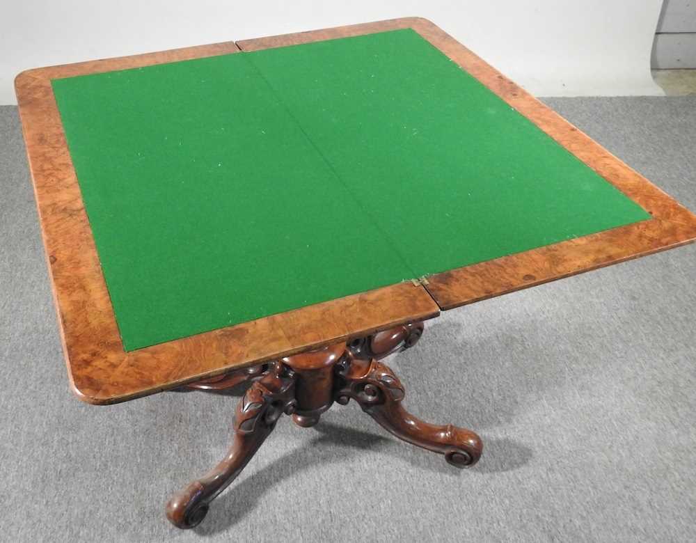 A Victorian burr walnut folding card table, the hinged rectangular top, on a carved column and - Image 3 of 4