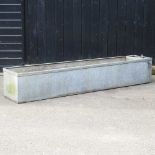 A large galvanised garden trough 245w x 46d x 41h cm Drilled drainage holes to the base