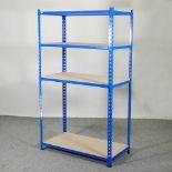 A metal shelving unit, with chipboard shelves 93w x 62d x 158h cm