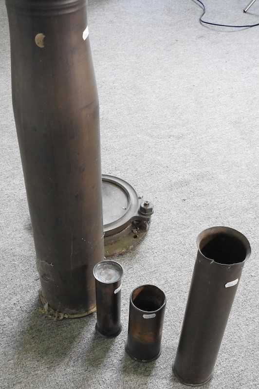 A brass shell case, 71cm high, together with three smaller and a ship's port hole window (5) - Image 4 of 4