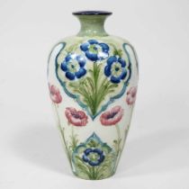 A Macintyre Moorcroft pottery vase, circa 1900, of shouldered form, tube lined with poppies, printed