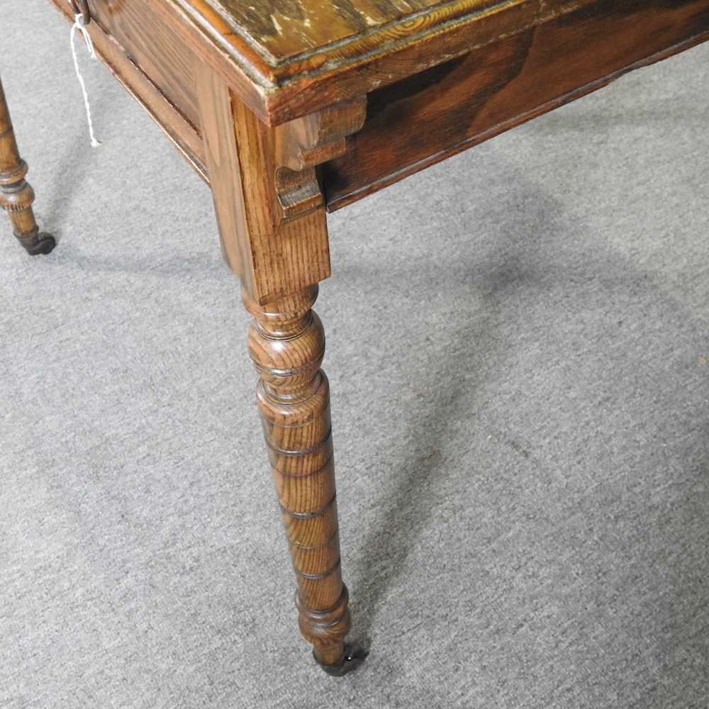 A late 19th century oak writing table, with an inset top, by Waring & Gillows 92w x 58d x 74h cm - Image 5 of 7