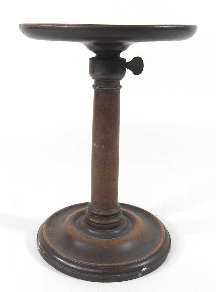 A 19th century turned mahogany stand, with an adjustable dished top, on a weighted base, 15cm - Image 3 of 5