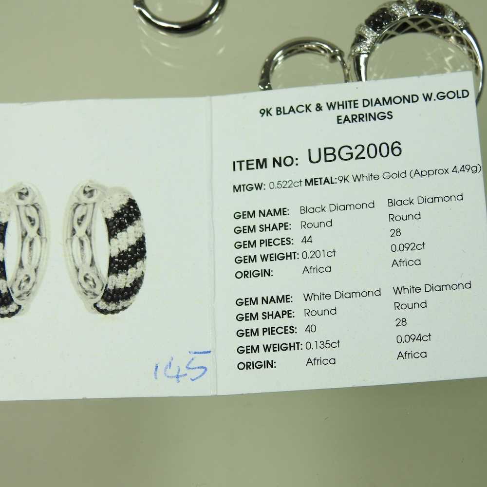 A 9 carat white gold, black and white diamond ring, of zig-zag design, 2.3g, size R/S, together with - Image 4 of 4