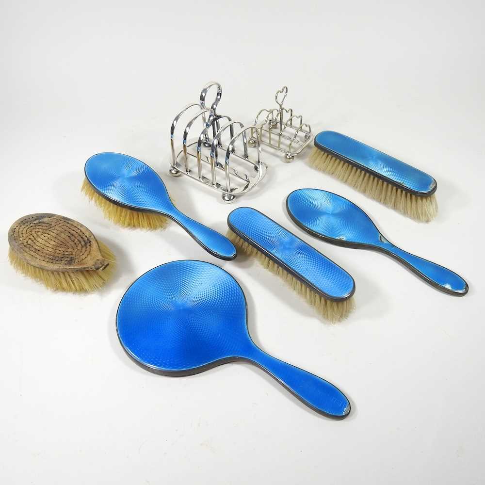 An early 20th century blue enamelled silver dressing table set, together with two silver plated