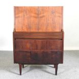 Attributed to Robert Heritage, a 1960's hardwood secretaire, with a hinged fall, on tapered legs 76w