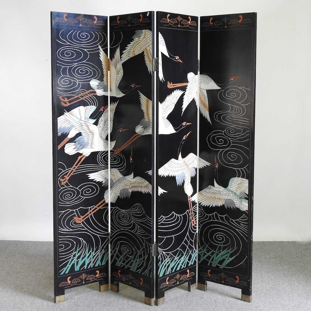 A Japanese black lacquered four-fold dressing screen, decorated with birds 160w x 183h cm