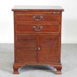 An Edwardian mahogany side cabinet, with a brushing slide 59w x 43d x 78h cm