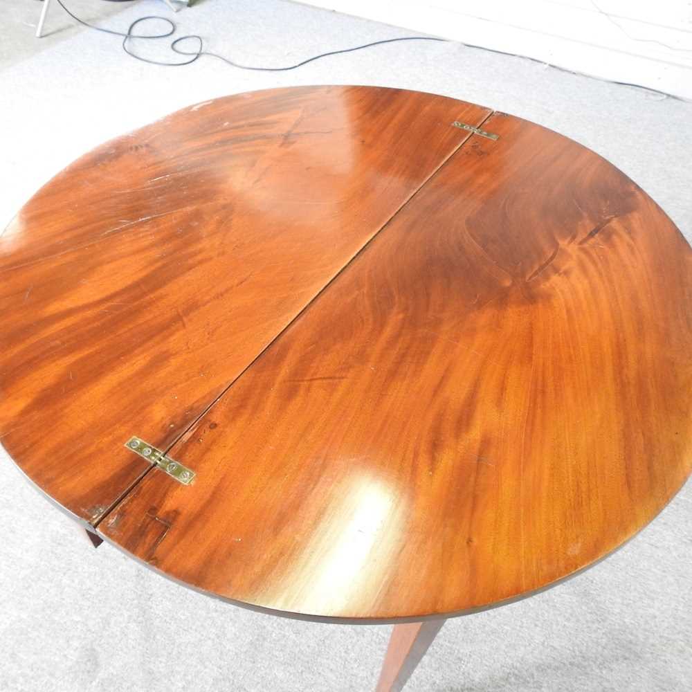 A George III mahogany D shaped folding tea table, on tapered legs 90w x 44d x 74h cm - Image 2 of 5