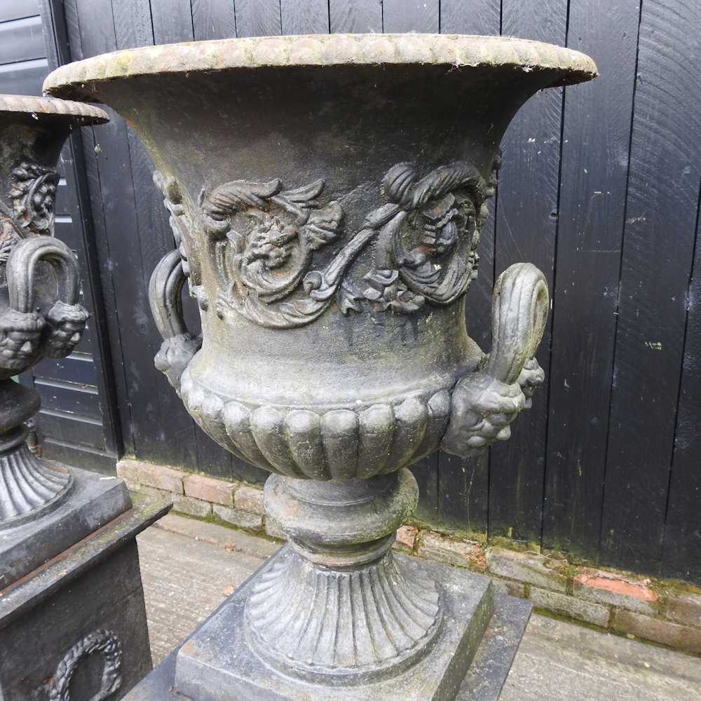 A pair of impressive black painted cast iron garden urns, each of classical design, with an acanthus - Image 6 of 9