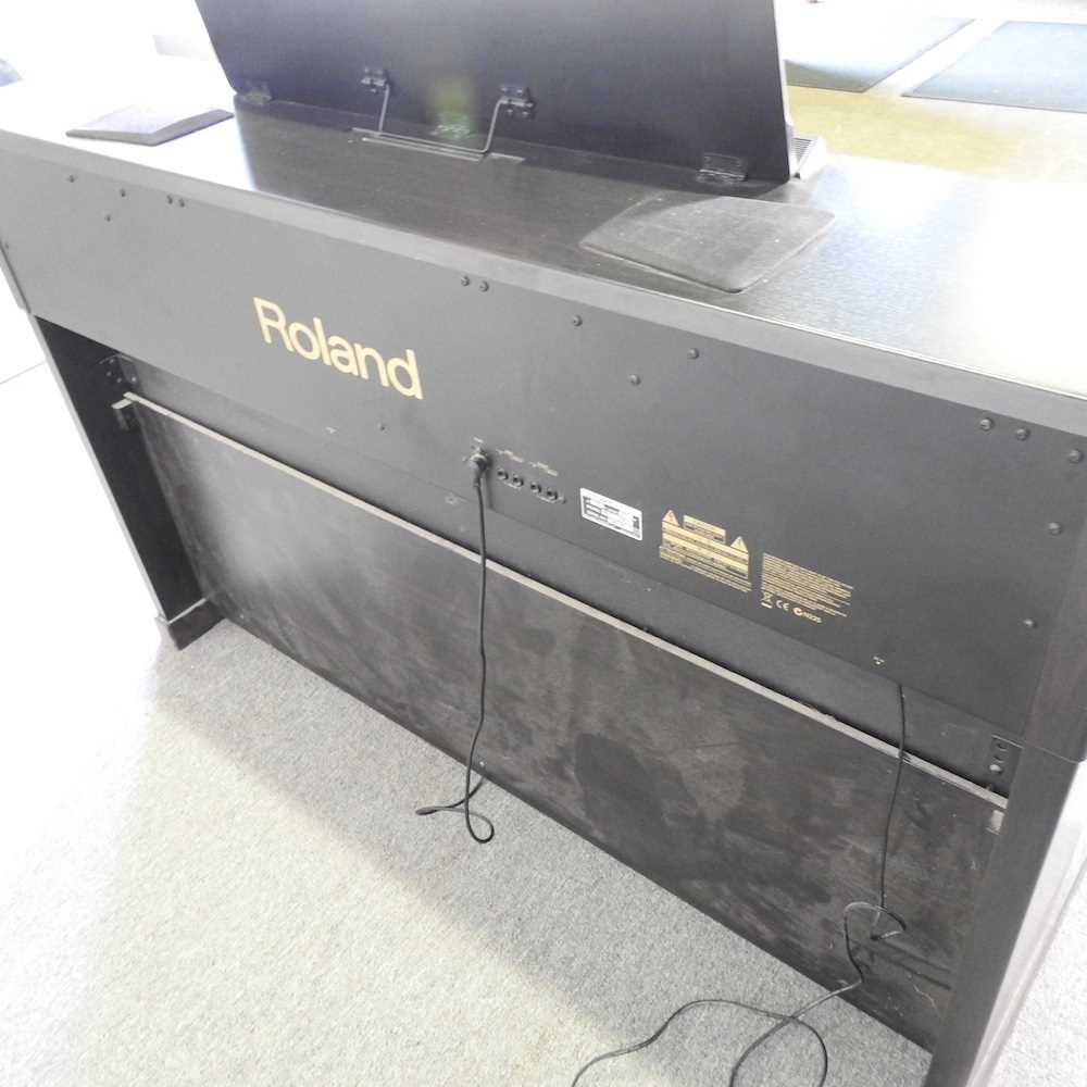 A Roland digital piano, HP107e, 141cm wide, with a piano stool - Image 10 of 13