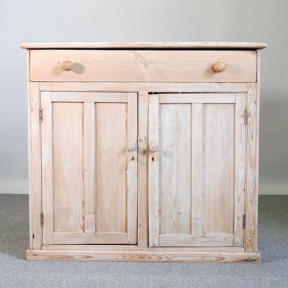 An antique pine side cabinet, with a single drawer 112w x 46d x 102h cm