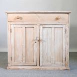 An antique pine side cabinet, with a single drawer 112w x 46d x 102h cm