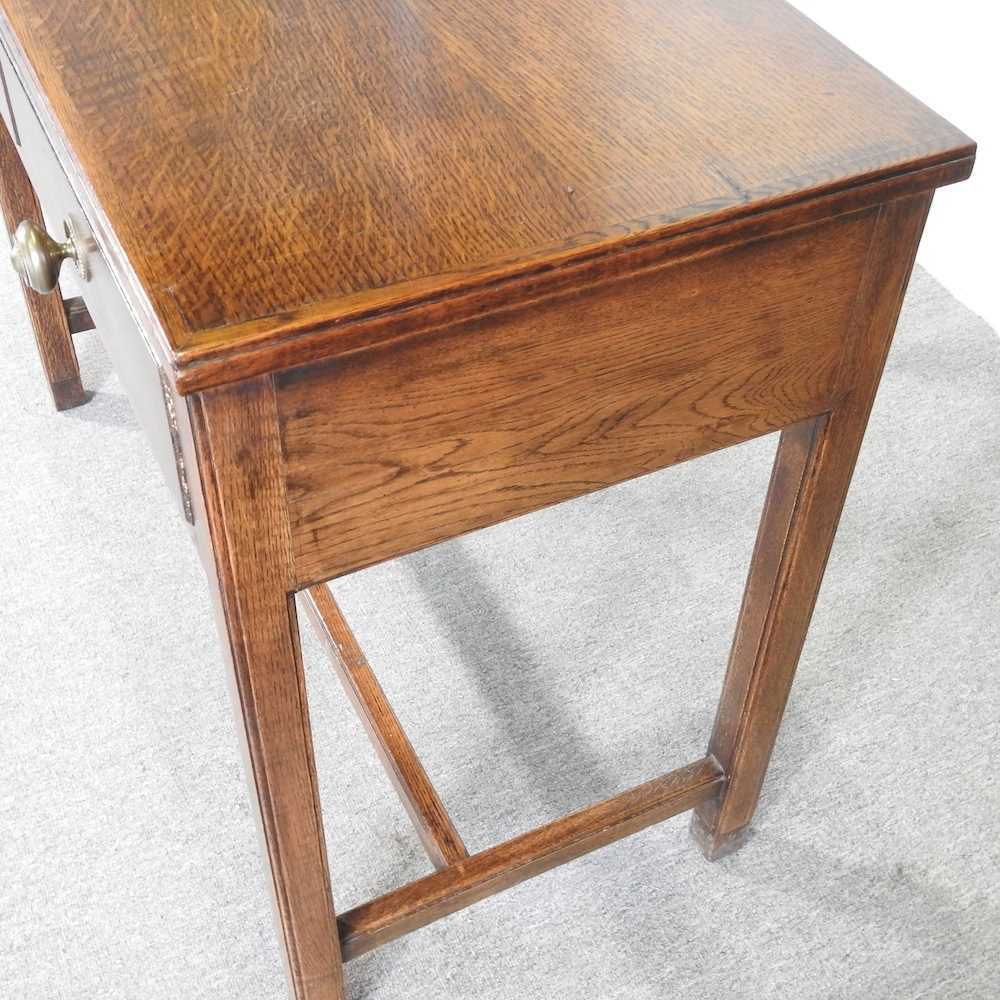 An early 20th century oak side table, containing two short drawers 99w x 50d x 82h cm - Image 5 of 5