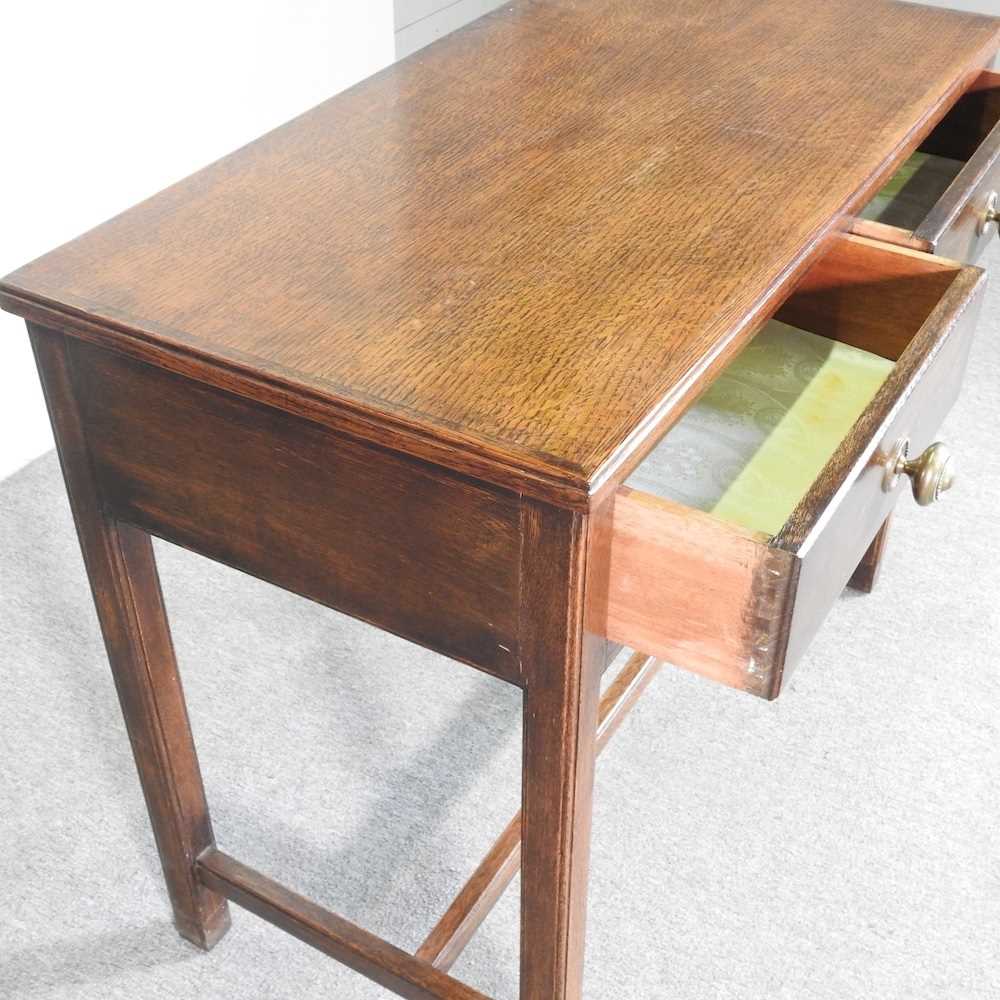 An early 20th century oak side table, containing two short drawers 99w x 50d x 82h cm - Image 4 of 5