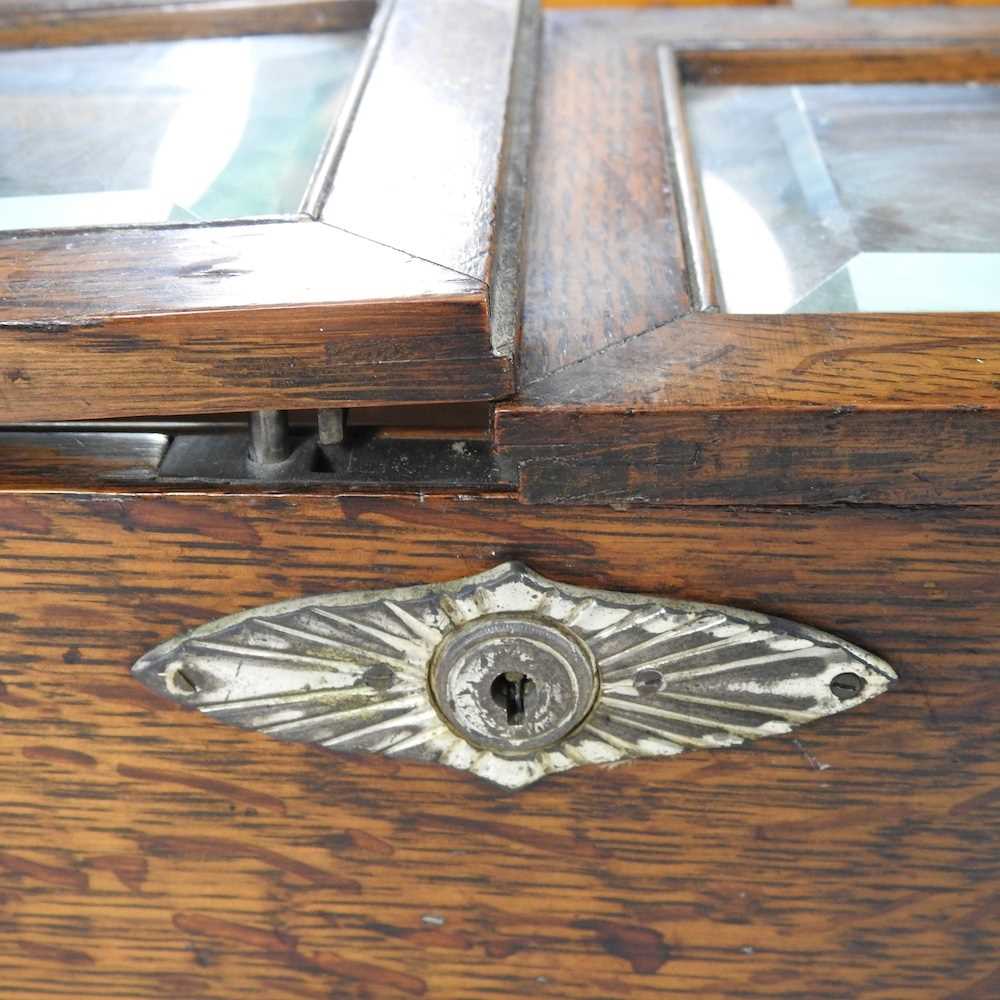 An early 20th century oak three bottle tantalus, with a drawer below, 41cm wide, together with a - Image 4 of 9