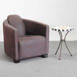 A brown upholstered aviator style armchair, together with a faux marble top occasional table,