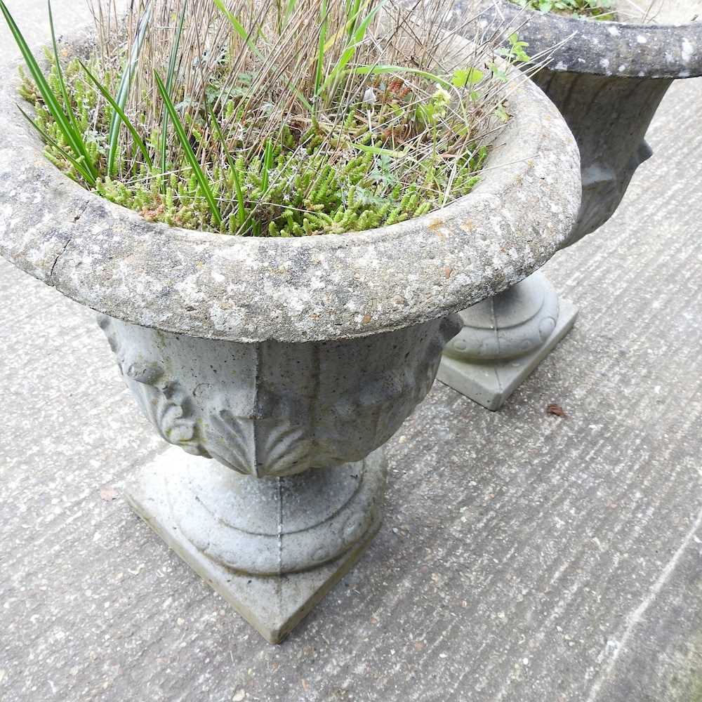 A pair of cast stone garden urns, of pedestal form, 57cm high (2) - Image 2 of 4