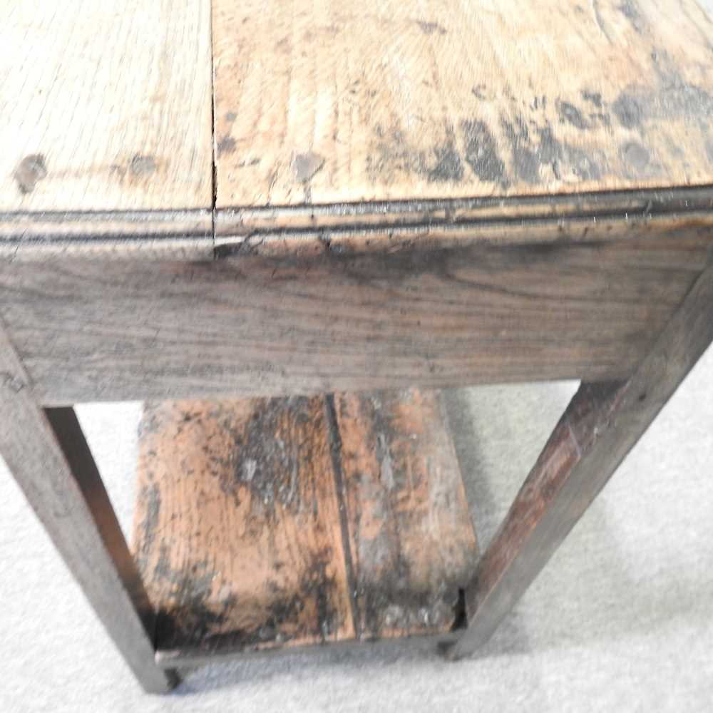 An 18th century Welsh dresser base, of narrow proportions, with an undulating frieze, on square - Image 12 of 19