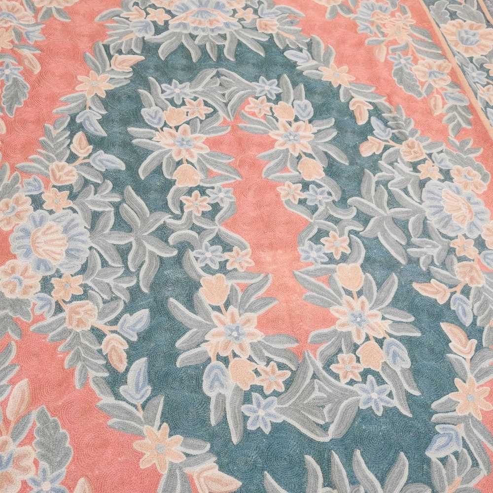 A wool chain rug, with floral decoration, 170 x 113cm - Image 2 of 4