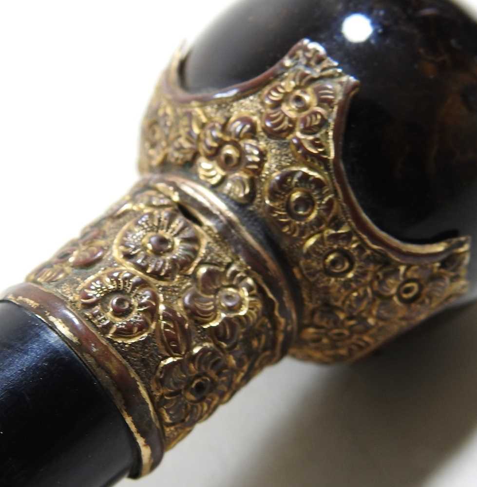 A late 19th/early 20th century ebonised walking cane, with a polished tiger's eye handle - Image 2 of 3