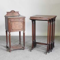 A rosewood nest of three occasional tables, together with an early 20th century French marble top