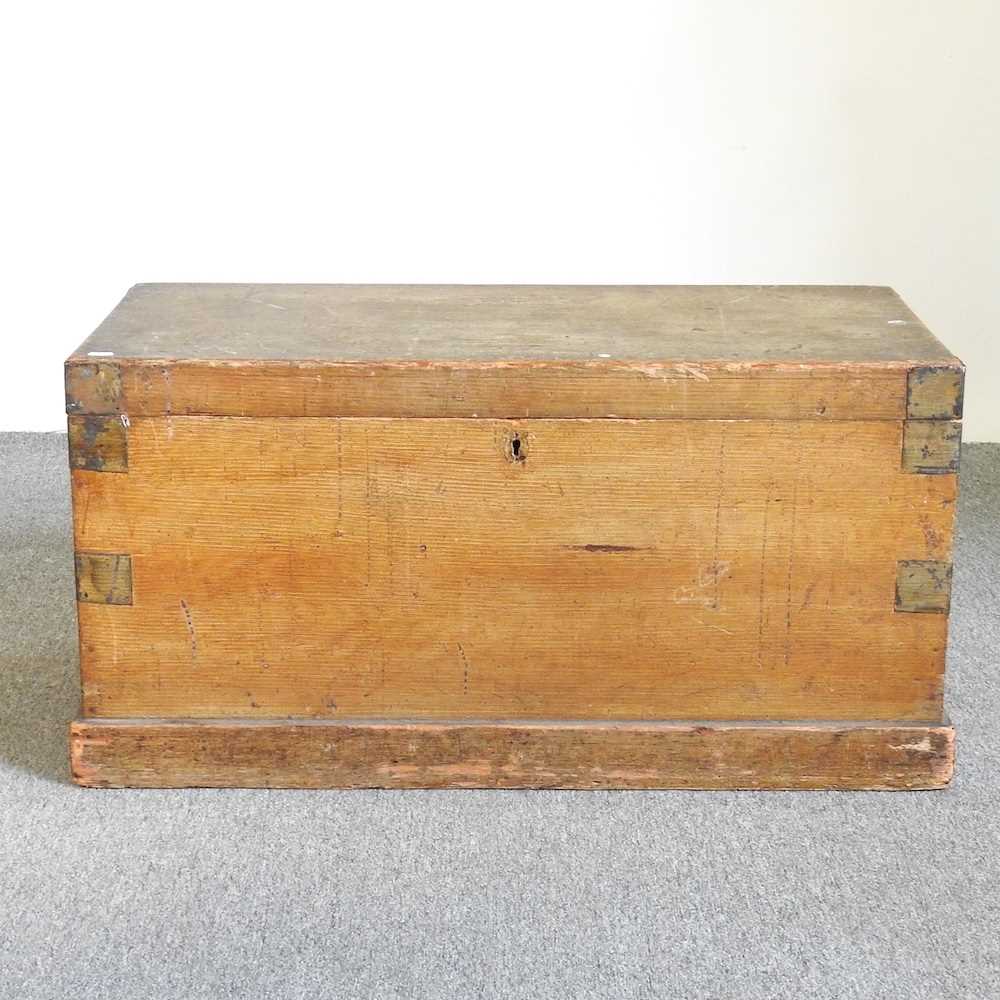 A 19th century pine trunk, with a hinged lid 90w x 44d x 47h cm
