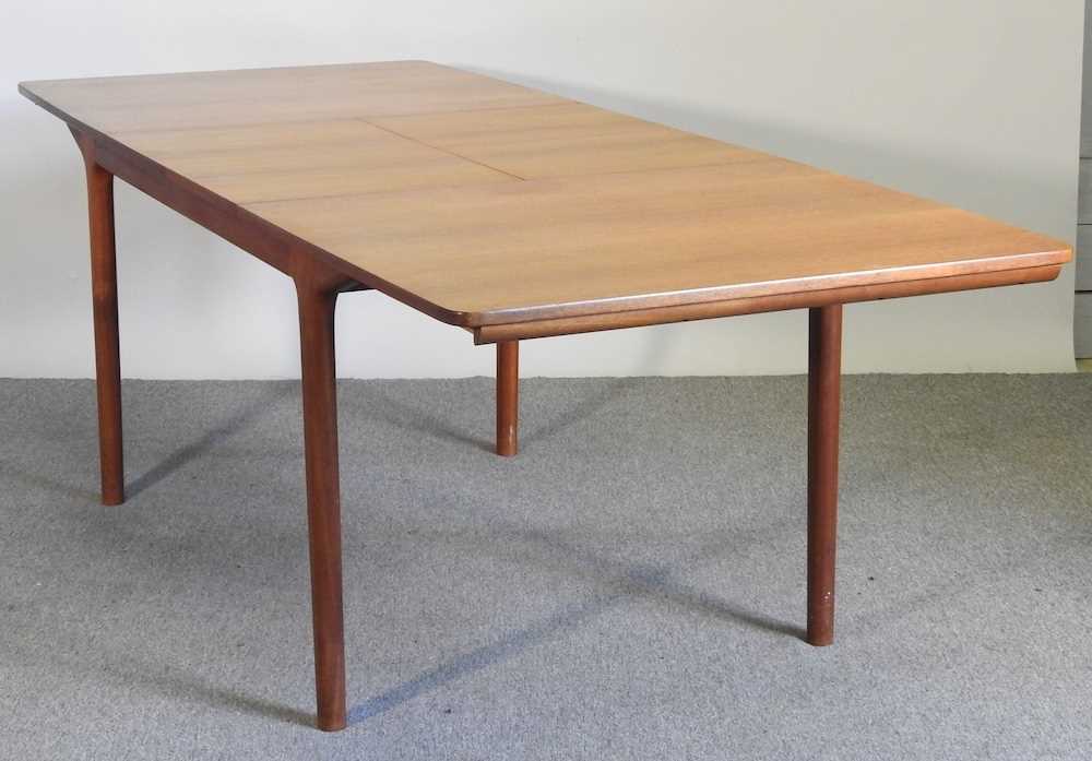 A 1970's teak extending dining table, with two additional leaves, bearing a label for A H McIntosh & - Image 4 of 5