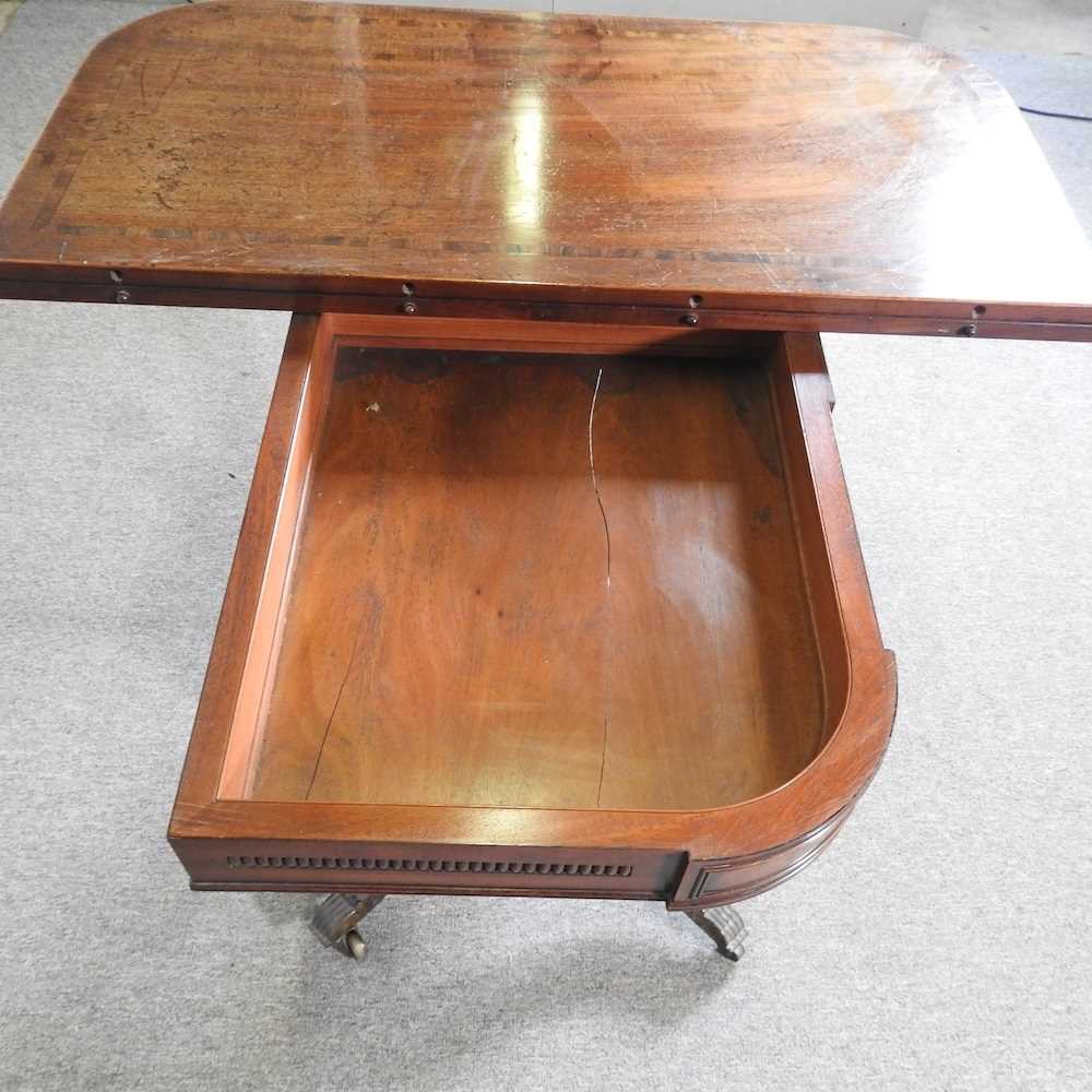 An unusual 19th century mahogany folding tea table, with a hinged rectangular top, on a carved U - Image 2 of 5