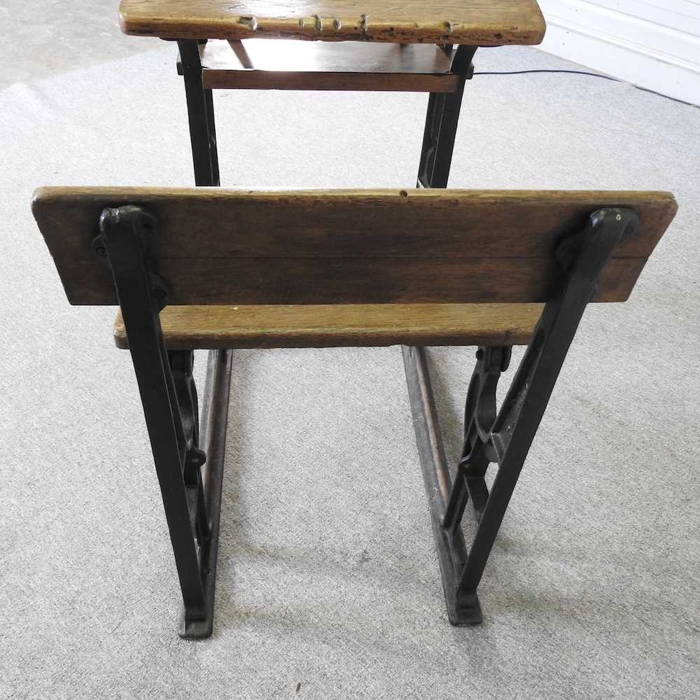 An early 20th century wooden school desk, on an iron frame 61w x 94d x 96h cm - Image 2 of 6