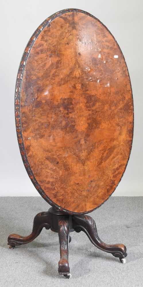 A Victorian burr walnut occasional table, with a hinged oval top, on a splayed base 106w x 73cm - Image 3 of 6