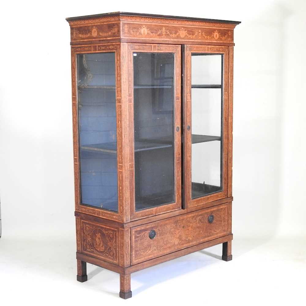 A 19th century Dutch marquetry vitrine, decorated with swags, portrait medallions and festoons,