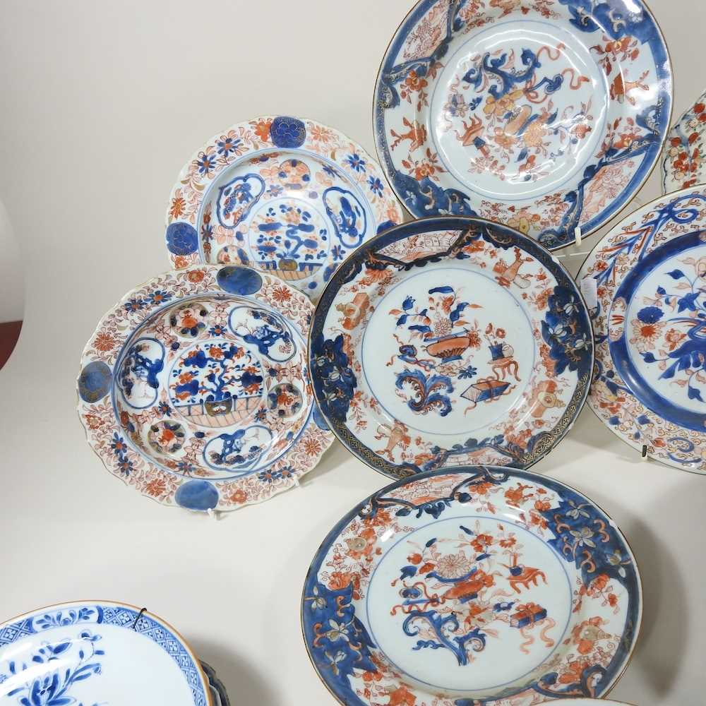 A collection of twelve 18th century Imari porcelain plates, each decorated with still life subjects, - Image 6 of 12