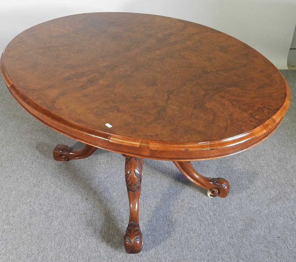 A Victorian burr walnut breakfast table, with a hinged oval top, on a quadruped base 136w x 102d x - Bild 3 aus 4