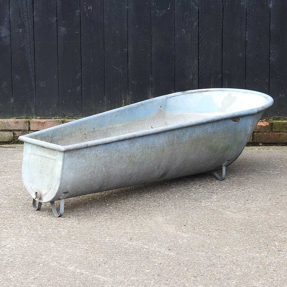 A cast iron bath, of tapered shape, 160cm long