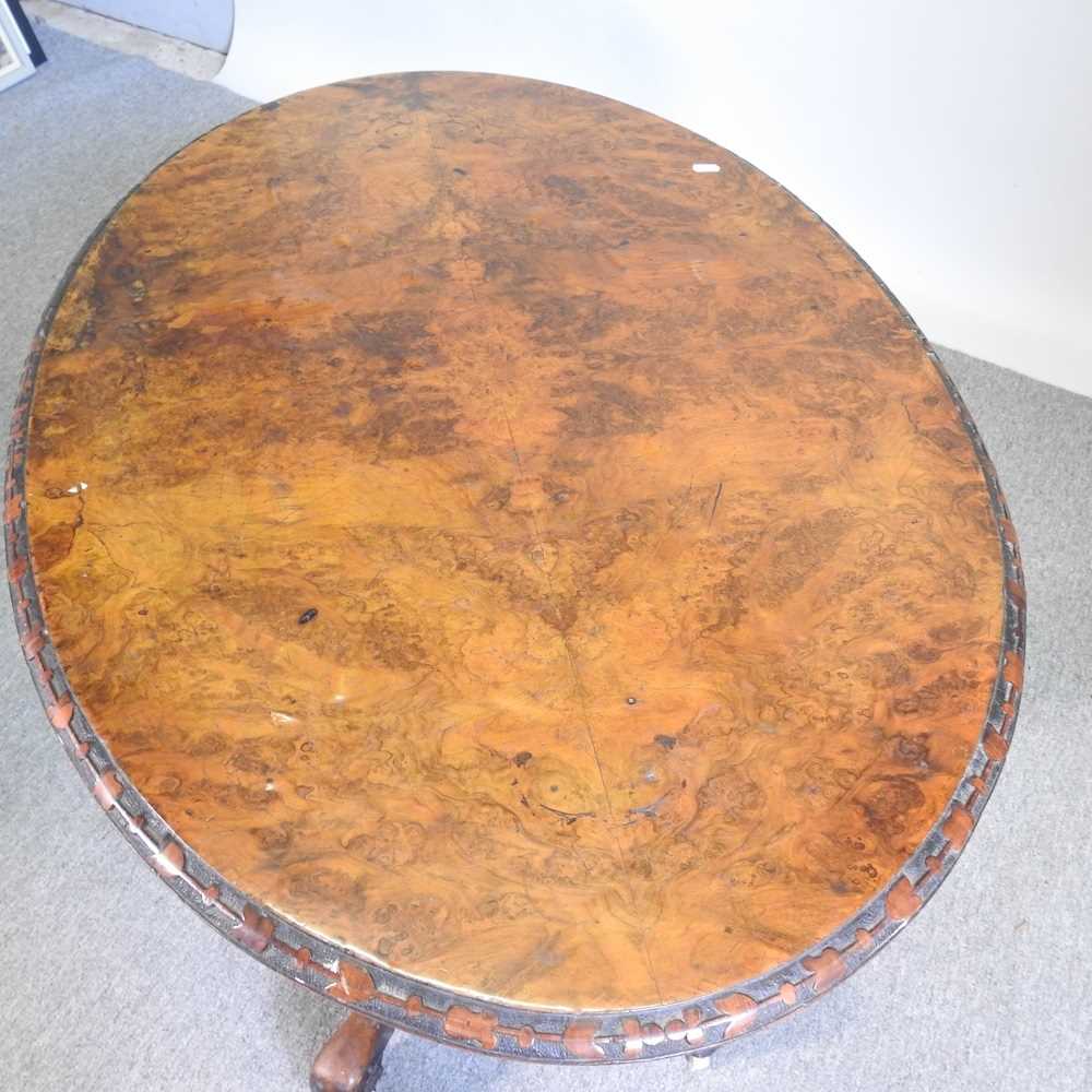 A Victorian burr walnut occasional table, with a hinged oval top, on a splayed base 106w x 73cm - Image 4 of 6