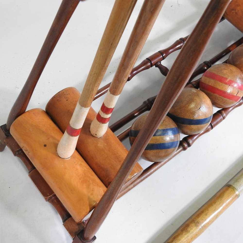 A mid 20th century F.H. Ayers, London wooden The Usborne patent Croquet Carrier Stand, with four - Image 12 of 14