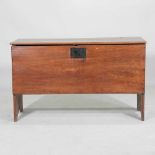 An 18th century elm six plank coffer, with a hinged lid 170w x 47d x 71h cm