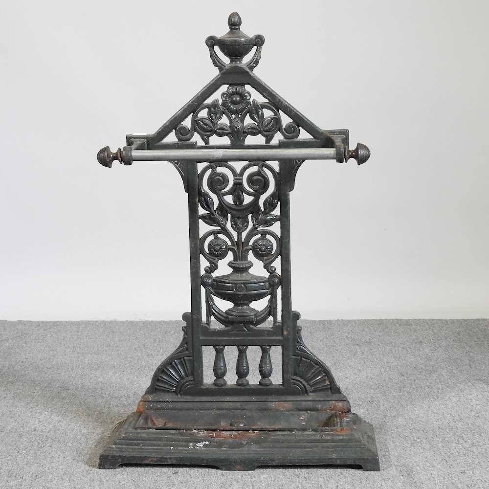 A painted cast iron stick stand 49w x 20d x 79h cm