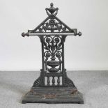 A painted cast iron stick stand 49w x 20d x 79h cm