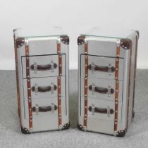 A pair of modern bedside chests, each in the form of a trunk, with a glass top (2) 31w x 31d x 62h