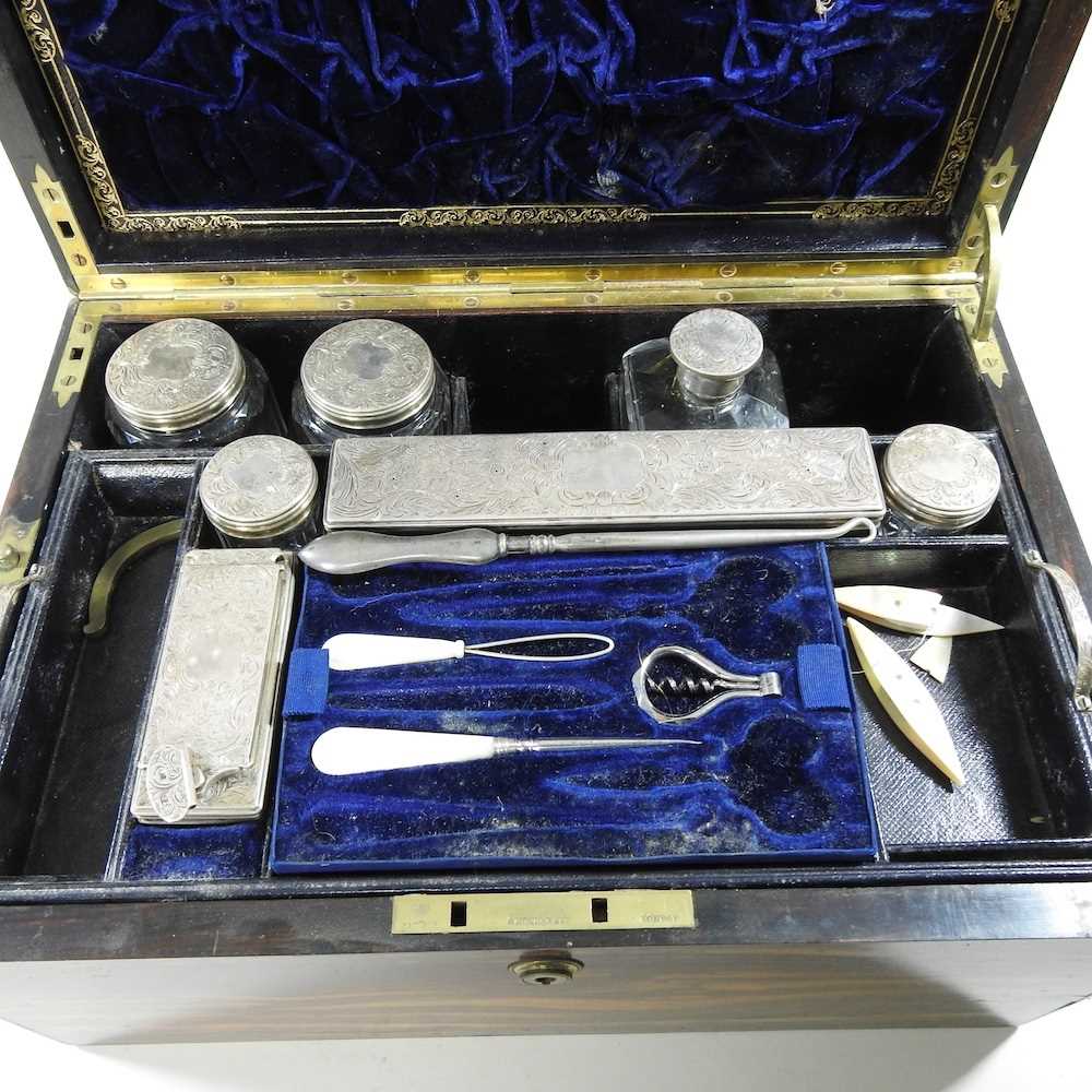 A 19th century patent brass bound coromandel dressing case, the velvet lined interior fitted with - Image 7 of 9