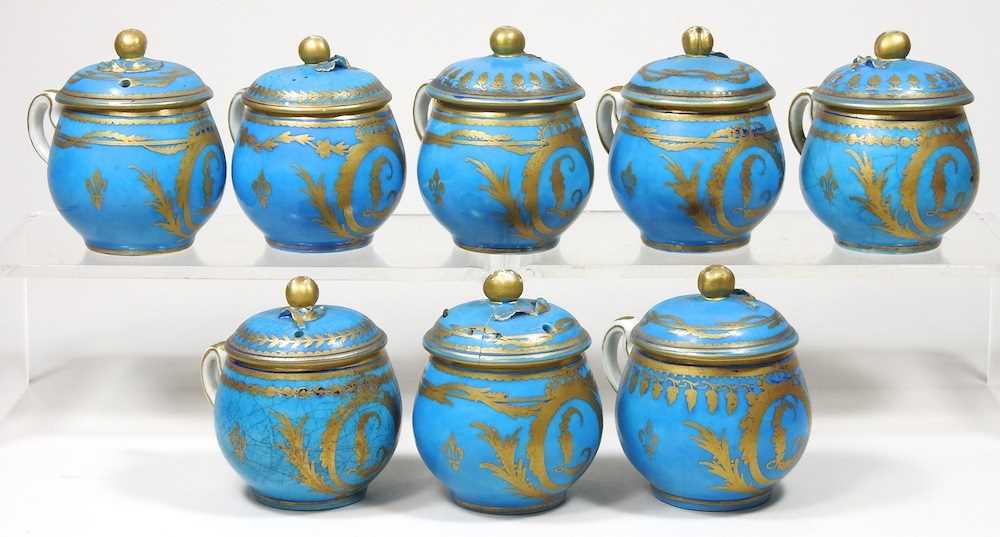 A set of eight 19th century Sevres porcelain custard cups and covers, with gilt decoration on a blue - Image 3 of 15