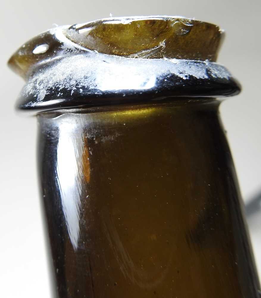 An 18th century English brown glass sealed wine bottle, inscribed All Souls Coll:C:R, 26cm high - Image 9 of 15